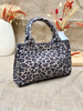Imagen de Cartera Faraday Animal Print