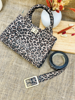 Imagen de Cartera Faraday Animal Print