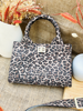 Imagen de Cartera Faraday Animal Print